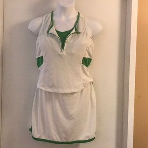 White tennis skirt and top with green trim…